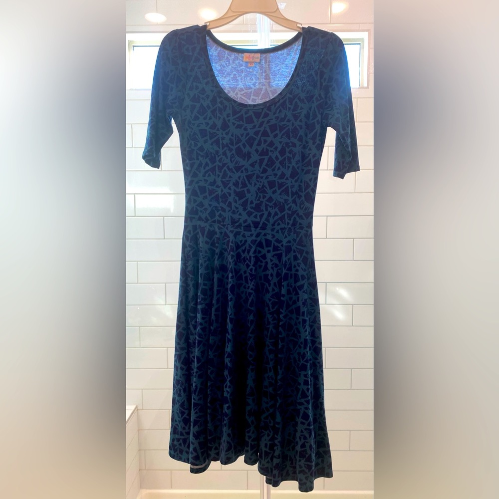 Like new worn 1x small Lularoe Nicole dress aqua/navy print shown in pictures
